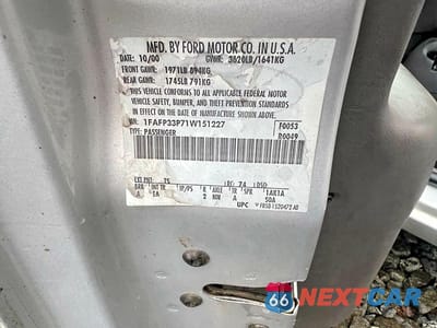 Zdjęcie 13 z 13 samochodu: 2001 FORD FOCUS LX VIN:1FAFP33P71W151227 - miniatura