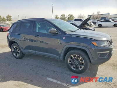 Czwarte zdjęcie samochodu z boku: 2017 JEEP COMPASS TRAILHAWK VIN:3C4NJDDB0HT656994 - miniatura