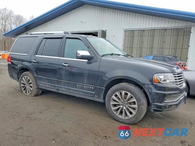 Czwarte zdjęcie samochodu z boku: 2015 LINCOLN NAVIGATOR VIN:5LMJJ2JT5FEJ04333 - miniatura