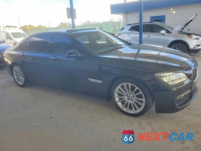 Czwarte zdjęcie samochodu z boku: 2014 BMW 740 LI VIN:WBAYE4C52ED138266 - miniatura