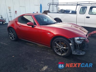 Czwarte zdjęcie samochodu z boku: 2017 MAZDA MX-5 MIATA GRAND TOURING VIN:JM1NDAM71H0105455 - miniatura