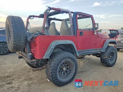 Trzecie zdjęcie samochodu z tyłu: 1999 JEEP WRANGLER / TJ SPORT VIN:1J4FY19S5XP437839 - miniatura