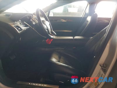 Zdjęcie 7 z 12 samochodu: 2016 LINCOLN MKZ HYBRID VIN:3LN6L2LU9GR606656 - miniatura