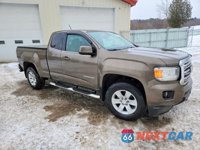 Czwarte zdjęcie samochodu z boku: 2016 GMC CANYON SLE VIN:1GTH6CEA2G1145727 - miniatura