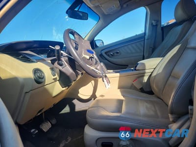 Zdjęcie 7 z 13 samochodu: 2013 FORD TAURUS SEL VIN:1FAHP2H8XDG162273 - miniatura