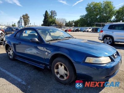 Czwarte zdjęcie samochodu z boku: 1999 FORD MUSTANG VIN:1FAFP4043XF108805 - miniatura