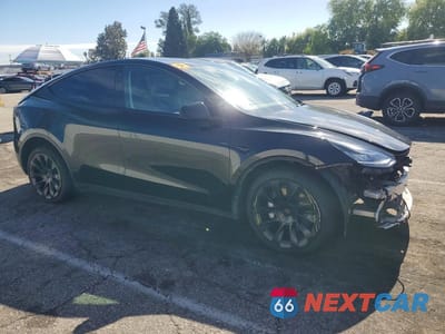 Czwarte zdjęcie samochodu z boku: 2021 TESLA MODEL Y VIN:5YJYGDEE4MF282628 - miniatura