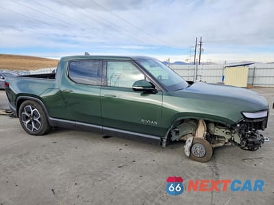 Czwarte zdjęcie samochodu z boku: 2023 RIVIAN R1T ADVENTURE VIN:7FCTGBAA2PN029504 - miniatura