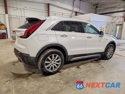 Trzecie zdjęcie samochodu z tyłu: 2021 CADILLAC XT4 PREMIUM LUXURY VIN:1GYFZDR46MF057233 - miniatura