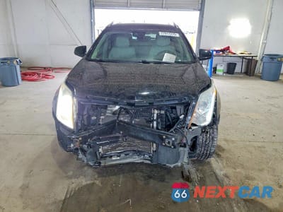 Piąte zdjęcie samochodu w środku: 2016 CADILLAC SRX PREMIUM COLLECTION VIN:3GYFNDE30GS572351 - miniatura