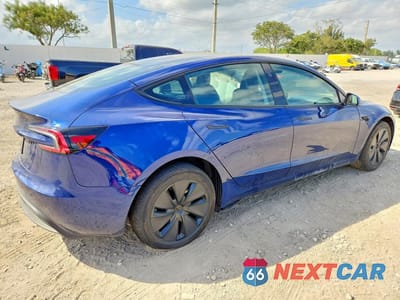 Trzecie zdjęcie samochodu z tyłu: 2024 TESLA MODEL 3 VIN:5YJ3E1EAXRF835477 - miniatura