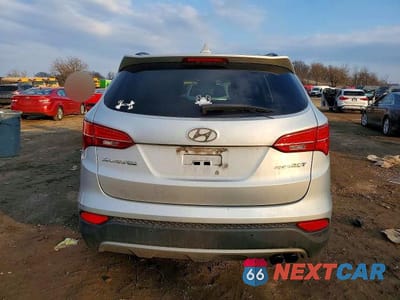 Zdjęcie 6 z 12 samochodu: 2014 HYUNDAI SANTA FE SPORT 2.0T VIN:5XYZW3LA2EG135610 - miniatura