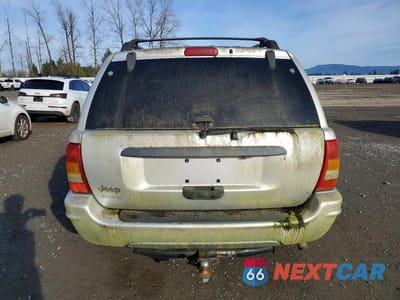Zdjęcie 6 z 13 samochodu: 2004 JEEP GRAND CHEROKEE LAREDO VIN:1J4GW48S04C343903 - miniatura