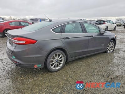 Trzecie zdjęcie samochodu z tyłu: 2017 FORD FUSION SE PHEV VIN:3FA6P0PU5HR330166 - miniatura