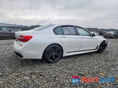 Trzecie zdjęcie samochodu z tyłu: 2018 BMW 750 XI VIN:WBA7B0C53JG527293 - miniatura