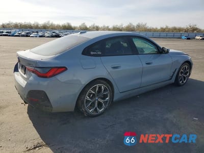 Trzecie zdjęcie samochodu z tyłu: 2022 BMW I4 EDRIVE 40 VIN:WBY73AW06NFN25084 - miniatura