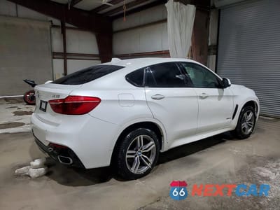 Trzecie zdjęcie samochodu z tyłu: 2019 BMW X6 XDRIVE35I VIN:5UXKU2C5XK0Z62954 - miniatura
