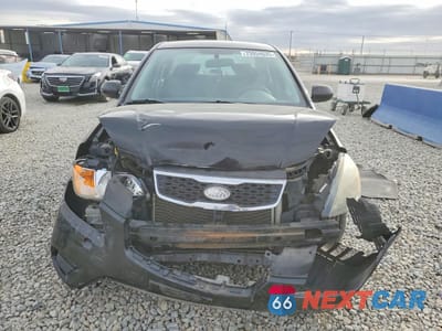 Piąte zdjęcie samochodu w środku: 2010 KIA RIO LX VIN:KNADH4A34A6613356 - miniatura