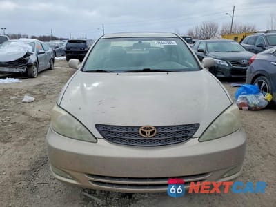 Piąte zdjęcie samochodu w środku: 2003 TOYOTA CAMRY LE VIN:4T1BE30K03U739195 - miniatura