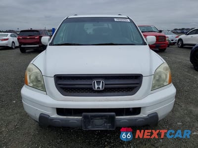 Piąte zdjęcie samochodu w środku: 2004 HONDA PILOT EXL VIN:2HKYF18774H594183 - miniatura