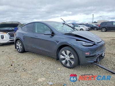 Czwarte zdjęcie samochodu z boku: 2023 TESLA MODEL Y VIN:7SAYGDED4PF971843 - miniatura