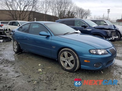 Czwarte zdjęcie samochodu z boku: 2004 PONTIAC GTO VIN:6G2VX12G64L287373 - miniatura