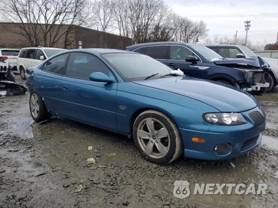 Czwarte zdjęcie samochodu z boku: 2004 PONTIAC GTO VIN:6G2VX12G64L287373 - miniatura