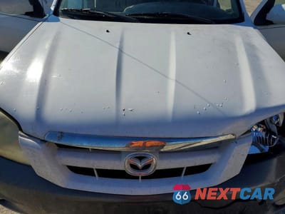 Zdjęcie 12 z 12 samochodu: 2005 MAZDA TRIBUTE S VIN:4F2CZ04165KM56974 - miniatura