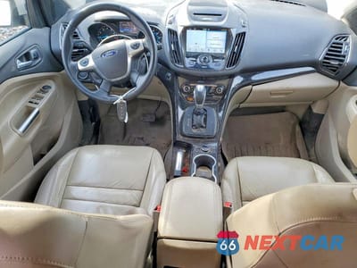 Zdjęcie 8 z 11 samochodu: 2016 FORD ESCAPE TITANIUM VIN:1FMCU9J94GUC42484 - miniatura