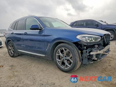 Czwarte zdjęcie samochodu z boku: 2021 BMW X3 XDRIVE30E VIN:5UXTS1C0XM9E85369 - miniatura