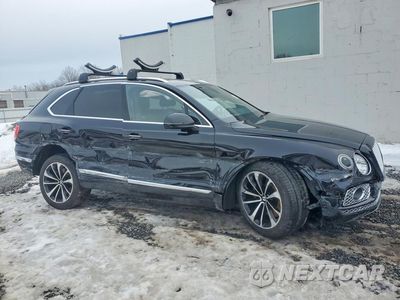 Czwarte zdjęcie samochodu z boku: 2017 BENTLEY BENTAYGA VIN:SJAAC2ZV1HC016001 - miniatura