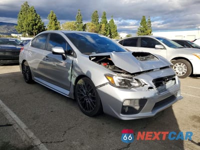 Czwarte zdjęcie samochodu z boku: 2017 SUBARU WRX PREMIUM VIN:JF1VA1E63H9832662 - miniatura