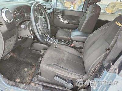 Zdjęcie 7 z 14 samochodu: 2014 JEEP WRANGLER SAHARA VIN:1C4AJWBG5EL302257 - miniatura