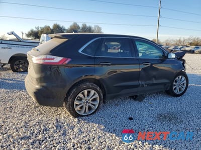 Trzecie zdjęcie samochodu z tyłu: 2022 FORD EDGE TITANIUM VIN:2FMPK4K91NBA51939 - miniatura