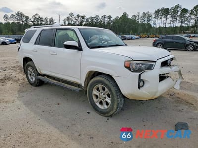 Czwarte zdjęcie samochodu z boku: 2015 TOYOTA 4RUNNER SR5 VIN:JTEZU5JR2F5093231 - miniatura