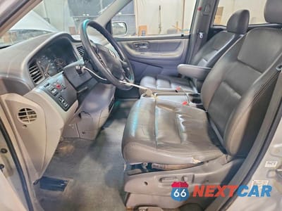 Zdjęcie 7 z 14 samochodu: 2003 HONDA ODYSSEY EXL VIN:2HKRL18083H004460 - miniatura