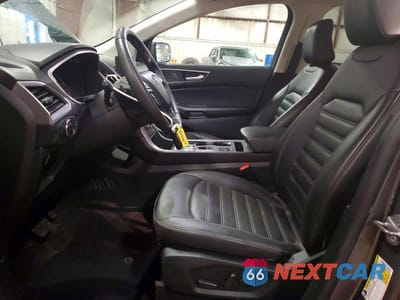 Zdjęcie 7 z 14 samochodu: 2021 FORD EDGE SEL VIN:2FMPK4J94MBA34407 - miniatura