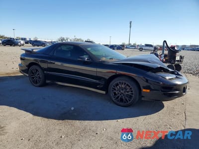 Czwarte zdjęcie samochodu z boku: 2000 PONTIAC FIREBIRD FORMULA VIN:2G2FV22G0Y2149766 - miniatura