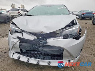 Piąte zdjęcie samochodu w środku: 2017 TOYOTA COROLLA L VIN:5YFBURHE2HP613904 - miniatura