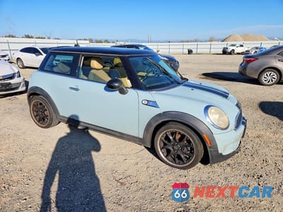 Czwarte zdjęcie samochodu z boku: 2009 MINI COOPER S VIN:WMWMF73519TW83707 - miniatura