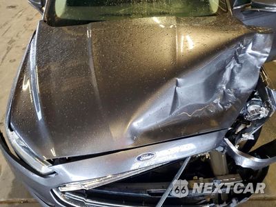Zdjęcie 11 z 12 samochodu: 2016 FORD FUSION SE HYBRID VIN:3FA6P0LU5GR157608 - miniatura