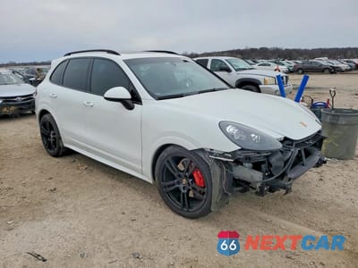 Czwarte zdjęcie samochodu z boku: 2013 PORSCHE CAYENNE GTS VIN:WP1AD2A25DLA71668 - miniatura