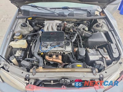 Zdjęcie 11 z 12 samochodu: 1999 TOYOTA CAMRY LE V6 VIN:JT2BF22K0X0155894 - miniatura