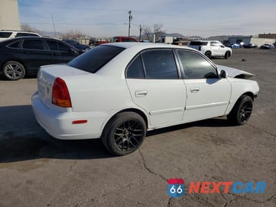 Trzecie zdjęcie samochodu z tyłu: 2003 HYUNDAI ACCENT GL VIN:KMHCG45CX3U423230 - miniatura