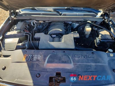 Zdjęcie 12 z 12 samochodu: 2017 GMC YUKON XL DENALI VIN:1GKS1HKJ9HR187163 - miniatura