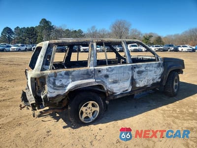 Trzecie zdjęcie samochodu z tyłu: 1996 JEEP GRAND CHEROKEE LAREDO VIN:1J4GZ58Y1TC149798 - miniatura