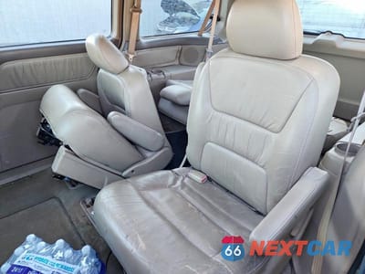 Zdjęcie 11 z 13 samochodu: 2002 HONDA ODYSSEY EXL VIN:2HKRL18002H560048 - miniatura