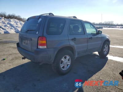 Trzecie zdjęcie samochodu z tyłu: 2003 FORD ESCAPE XLT VIN:1FMYU031X3KB12997 - miniatura