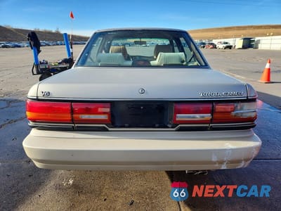 Zdjęcie 6 z 12 samochodu: 1991 TOYOTA CAMRY DELUXE VIN:4T1VV21E1MU062904 - miniatura