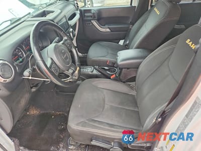 Zdjęcie 7 z 13 samochodu: 2015 JEEP WRANGLER UNLIMITED SAHARA VIN:1C4BJWEG9FL723271 - miniatura